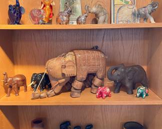 Part of a larger elephant collection and Thai items.