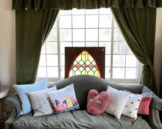 Sofa and pillows, another view of stained glass