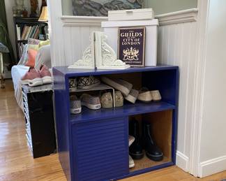 small blue cabinet, bookends etc.