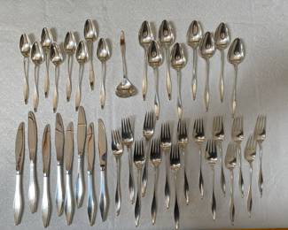 Sterling MCM set for 8 minus one dessert fork, but has an additional sauce spoon. 