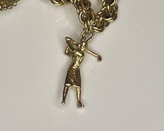Gold golfer charm 