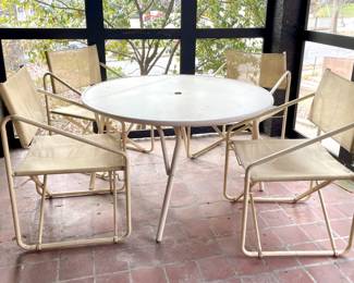 Nomad Brown Jordan Umbrella Table & 4 dining chairs. Frame color: #34 Vanilla, Fabric: Versace’s Mesh #513 Laser Vanilla 