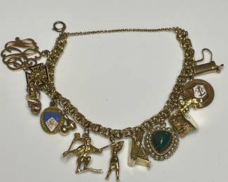 Vintage Charm bracelet with 12k gold, 14k gold, and gold tone charms 