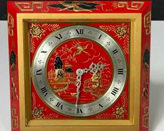Chelsea Clock Co. "Chinese Lacquer" desk clock, 8-day spring driven brass lever movement.  Hand painted enamel case with black and gold design on a red background.  Chelsea produced these clocks for Tiffany & Co.  