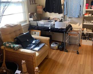 Wicker chair, electronics , very nice collection of button up ladies shirts. 