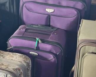 Vintage and newer luggage sets