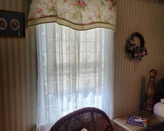 Various sets of curtains and valances throughout the home