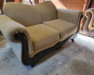 Love seat with wood trim front
