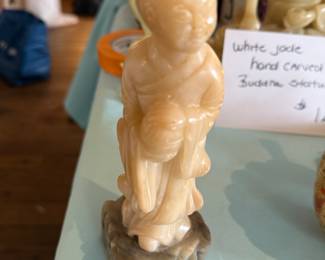 White jade hand carved sculpture of a wise ancient. 