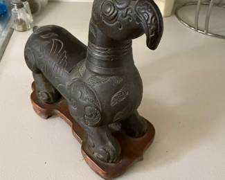 Lighter the head is a lighter - the tail holds the cigarette 