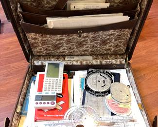 Aviation maps, pilot training books, tools