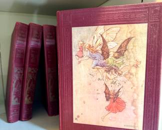 The home university, bookshelf, volumes, one through seven