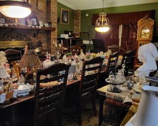 Grand father clock in back and dining table take leafs out seats 4 with leafs can seat up to 12 and misc pieces