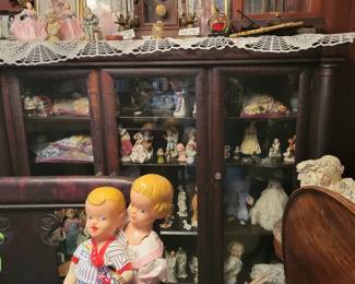 Large wooden. Bookcase 3 wood glass doors buster brown store display kids