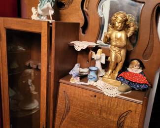 Great look gun cabinet with built in mirror and hidden desk