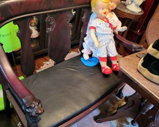 Renaissance revival settee has matching chair