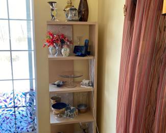 Lots of shelving, wall display, showcases…