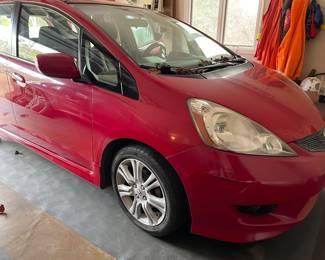 2010 Honda Fit, 128,000 miles, new battery, recent oil change, great gas mileage.
