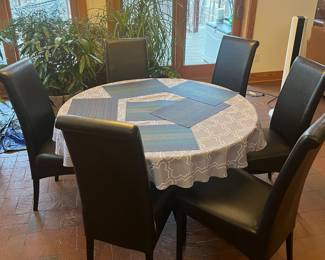 *Available for presale. Contact for pricing.* Fine Italian black leather dining chairs. Set of 6. Immaculate condition. Sold as a set. Table not included.