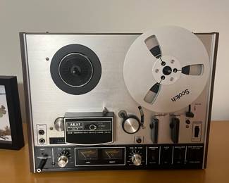 Akai 4000DS MKII reel-to-reel tape recorder, produced in Japan from 1973-1978. Key features include: 
It's a 3-head, 4-track, 2-speed machine.
It records in stereo using either a microphone or RCA jacks and uses 1/4" magnetic tape.