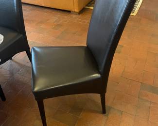 *Available for presale. Contact for pricing.*  Fine Italian black leather dining chairs. Set of 6. Immaculate condition. Sold as a set. 