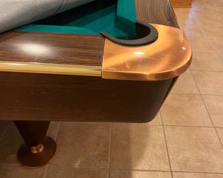 *Available for presale. Call for pricing* Brunswick Gold Crown III billiards table. This is a professional-grade slate pool table with adjustable leg levelers and sound-dampening ball returns. 