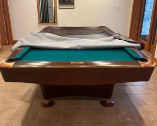 *Available for presale. Call for pricing* Brunswick Gold Crown III billiards table. This is a professional-grade slate pool table with adjustable leg levelers and sound-dampening ball returns.