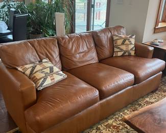 *Available for presale. Contact for pricing* Vintage Ralph Lauren brown leather sofas, matching pair. Beautiful brown patina. These are gorgeous luxury sofas. Light wear as shown in pictures. 