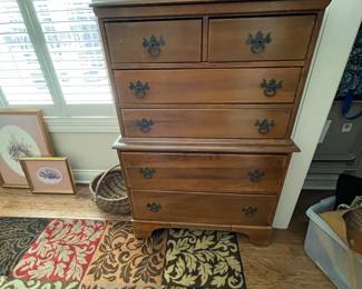 chest of drawers, area rug