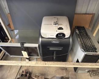 1012  Dell Desktop Computer with Keyboard, Samsung Monitor, Epson Projector, and Fellowes Paper Shredder