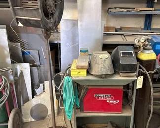 1038  Lincoln Electric Welder, Welding Cart with CO2 Tank, Shop Fan with Adjustable Stand, Welding Masks