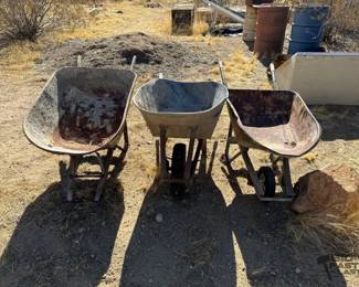 5204  3 Metal Wheel Barrels one is missing its Wheel