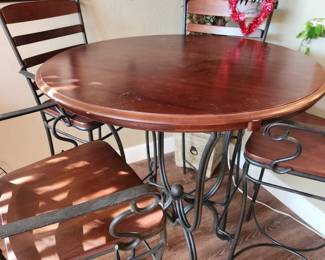 Wood/Wrought Iron High Table and 4 Matching Wrought/Wood Chairs.