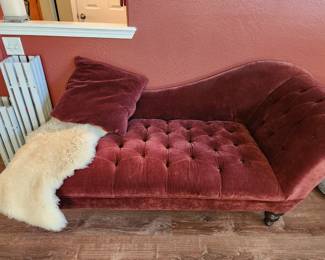 How about a lovely 'fainting' couch! Sheep Skin Rug.