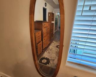 Oval Wood framed Mirror.