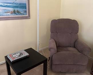 Comfy recliner in perfect condition, no stains, no scratches. End table on the left and beautiful lamp.