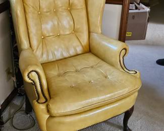 Yellow leather wing chairs by Classic leather