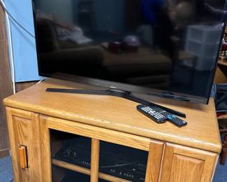 entertainment center, vhs/dvd combo and samsung tv