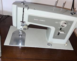Kenmore sewing Machine w/cabinet