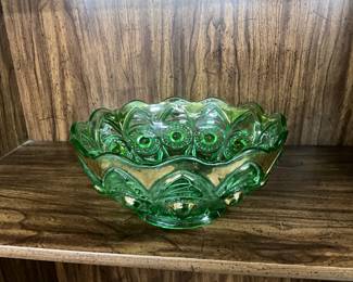 Green Glass bowl possibly dates to Depression era 1920s to 1930s