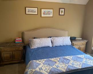 Lovely King bed accented with Camden Hall by Lexington marble top nightstands.