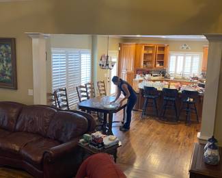 Rare photo of super cool staff person transforming this normal everyday lake mansion into an estate shoppers paradise.