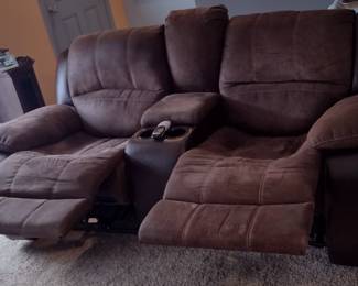 Brown Couch with 2 Recliners, middle has a storage area with 2 drink holders for $300.