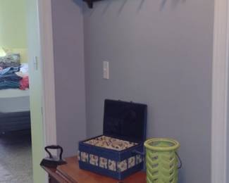Large Wood Hanging Shelf $45,
Wood Sewing Cabinet $30,
2 Vintage Cast Iron Irons $10 each,
Sewing Box $5, Canning Jar with Wooden Spools $5