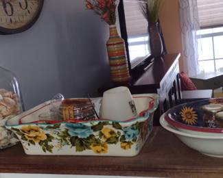 Wall Clock, Kitchenwares, Seashells, and so much more that needs to come out of kitchen cabinets still.