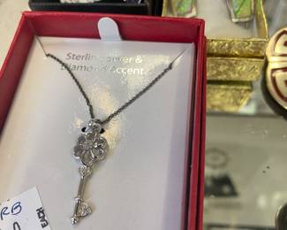 sterling key w/ real baby diamond