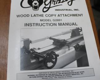 Grizzley Wood Lathe with a customized stand including built in drawers with wheels and all hand made and wook material, remember the client was a wood crafter.