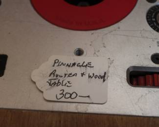 Custom made router and router table.