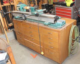 Notice the cusomized cabinet for the lathe