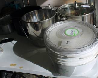 Lots of kitchen items including a Pickle Pickler looks like never used.